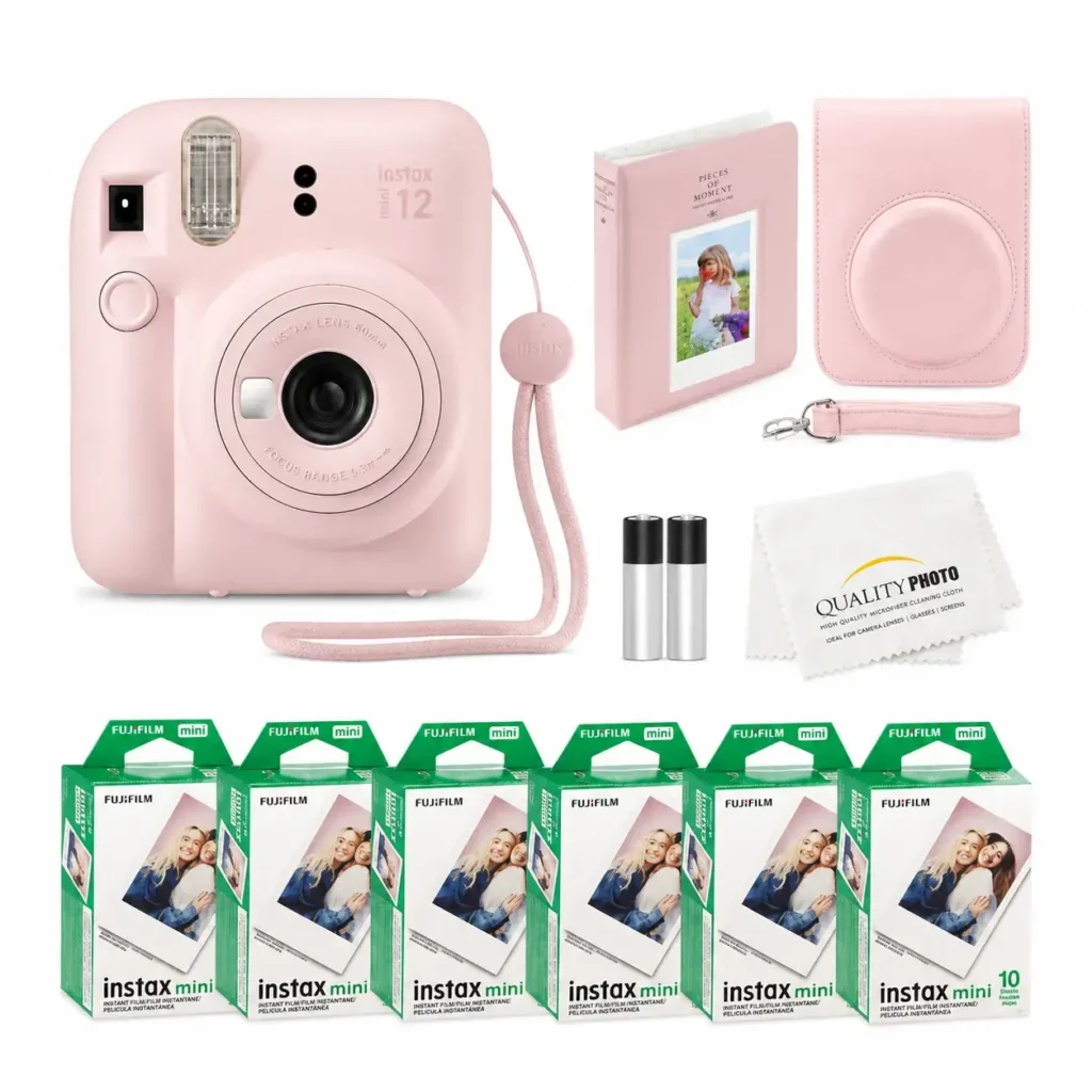 Pink INSTAX MINI 12 instant camera bundle with Fujifilm Instax Mini film, pink case, photo album, wrist strap, batteries and cleaning cloth.