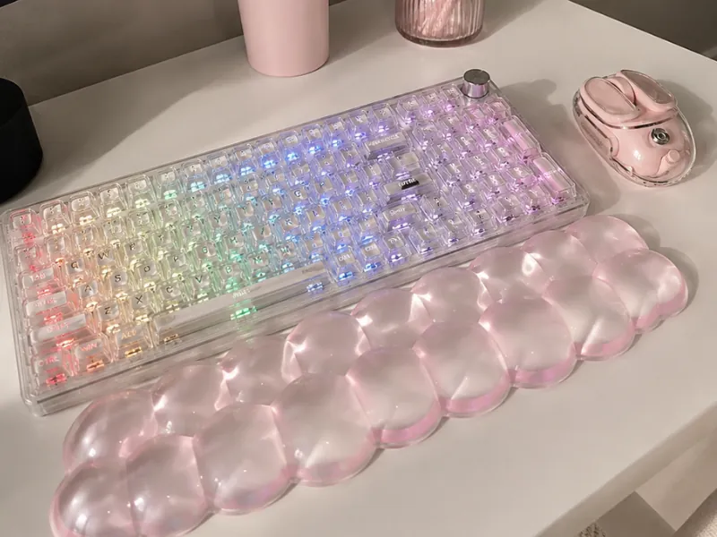 Cute clear YUNZII X98 mechanical keyboard with rainbow RGB lighting, pink mouse and bubble wrist rest