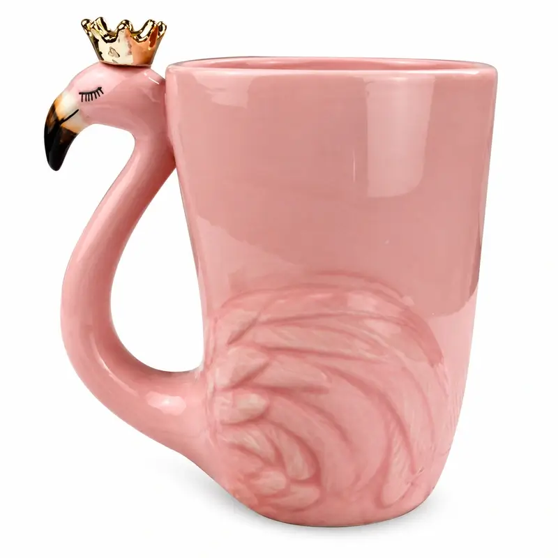 Pink flamingo ceramic coffee mug with crown-shaped gold detail and flamingo handle.
